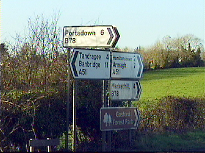 Signposts beside Marlacoo Lake.